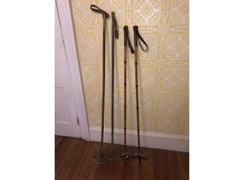 Two Pair Antique Ski Poles 51in And 54in Leather Features