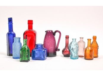 Collection Of Colorful Glass Bottles