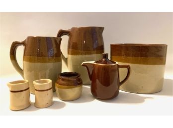 Glazed Pottery Crock, Two Pitchers, Three Creamers & Sugar Bowl