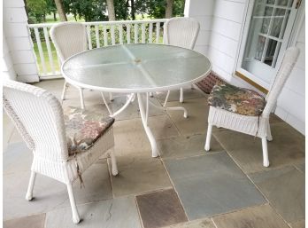 Glass Top Patio Table And Vinyl Wicker Chairs
