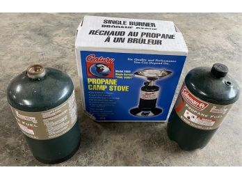 Propane Camp Stove And Two Half Used Propane Cans