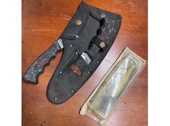 Knife, Hatchet, And Fishing Lure