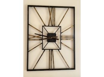 A Howard Miller Black With  Gold Tone  Metal Rectangle Wall Clock - 23.5'w X 31'h