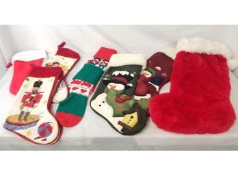 Eight Classic, Knit & Needlepoint Christmas Stockings