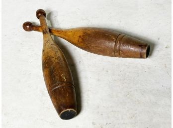 A Pair Of Antique Wood Juggling Pins