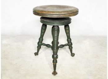 A Victorian Claw Foot Piano Stool