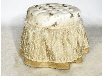 A Tufted And Skirted Ottoman