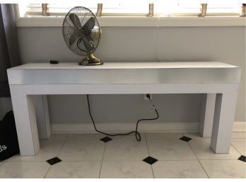 A Laminate White And Silver Console Table