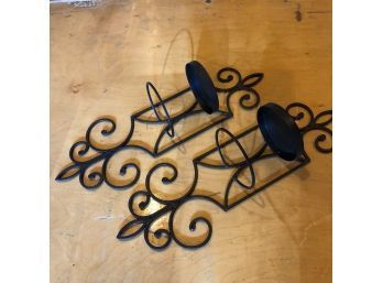 A Pair Of Wrought Iron Pillar Candle Sconces