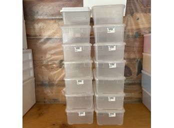 2 Stacks Of Clear Plastic Shoe Boxes