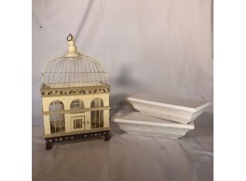 A Decorative Bird Cage And 2 Wall Shelves