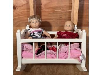 2 Baby Dolls In A Cradle