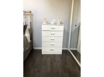 A White Laminate Dresser With 5 Drawers