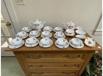 CARLSBAD PORCELAIN CUPS AND SAUCERS