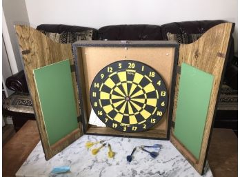 Dart Board In Cabinet And Darts