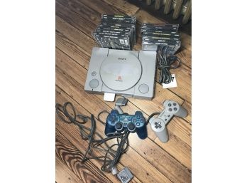 Sony Playstation , Two Remote Controls , Cords And Games