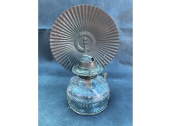 Short Oil Lamp With Large Circular Reflector