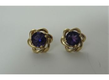 Round Amethyst Set In 14k Yellow Gold Earrings