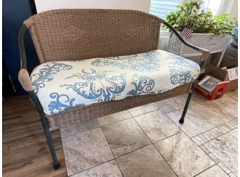 Wicker Style Seat With Floral Patterned Cushion