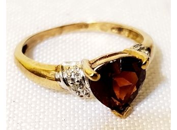 Ladies 10K Yellow Gold Heart Shaped Garnet Ring With Small Diamond Accents