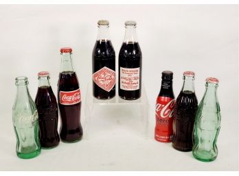 Selection Of Eight Vintage Coca Cola Collectible Bottles - Full & Empty-Including 2 1976 Grand Opening Bottles