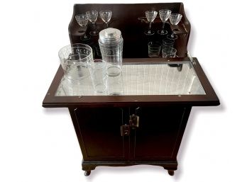 Mid Century Bar Cabinet With Pop Up Top Plus Original Etched Glass Bar Ware 26.5' X 18.25' X 36'