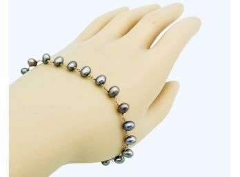 Exquisite Strand Of Rare Tahitian Black Peacock Pearls And Solid 18K Gold Bracelet