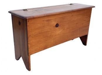 An Antique Pine Bench With Storage