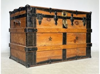 A Large, Restored Antique Travel Trunk