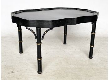 A Chinoiserie Lacquerware Coffee Table With Faux Bamboo Motif