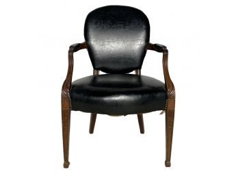An Upholstered Balloon Back Armchair In Leather With Nailhead Trim