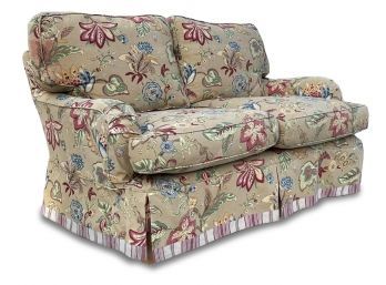 A Slipcovered Loveseat By Butera Home Furnishings