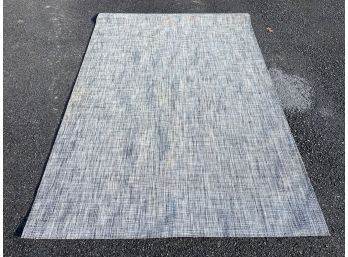 A Large Area Rug By Chilewich