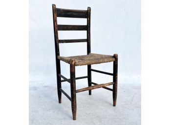 An Antique Ladder Back Rush Seated Side Chair