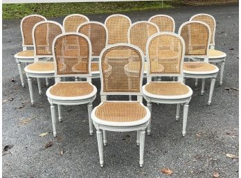 A Set Of 12 Caned Louis XVI Style Round Back Dining Chairs (AS IS)