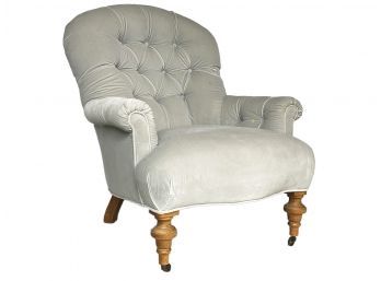 A Tufted Velvet Upholstered Arm Chair