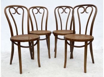 A Set Of 4 Vintage Bentwood Chairs With Cane Seats