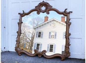 A Very Large Carved Wood Framed Mirror