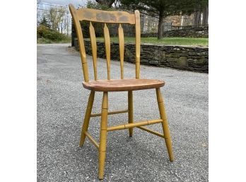 An Antique Spindle Back Chair