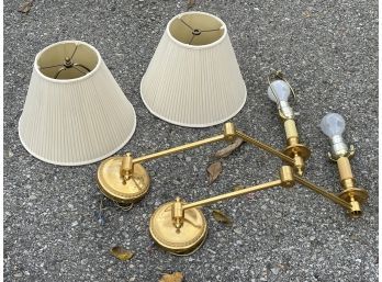 A Pair Of Reticulating Arm Brass Sconces