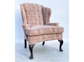 A Wing Back Chair In Faux Animal Print