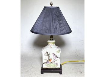 A Ceramic Lamp On Wood Base