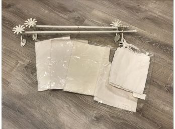Two White Adjustable Rods