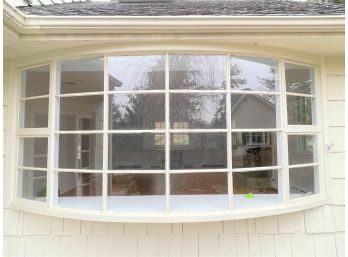 A Large Bay Window With Operable Side Windows