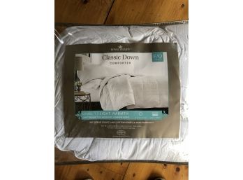 A Queen Sized Down Comforter In Packaging - Retail $200