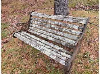 A Metal And Wood Detailed Garden Bench