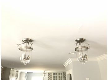 A Pair Of Semi Flush Ceiling Fixtures With Glass Shades