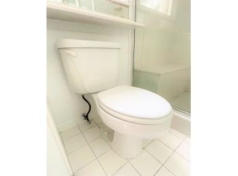 An American Standard Toilet - 6.0 Lpf/1.6 Gpf