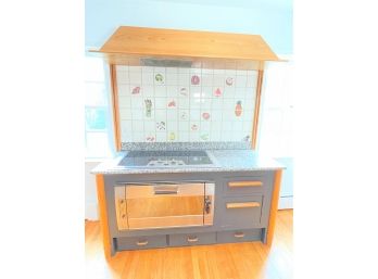 A Cooking Console- GE Profile Cooktop, Gaggenau Electric Oven, Electric Hood And Granite Countertop