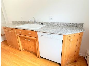 A Granite Countertop With Sink, On Wood Base Units - Unusual European Design